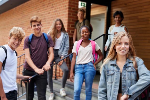A level students gathered on school steps